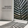 Outsunny Decorative Garden Privacy Screen with Stand, 6.5FT Freestanding Metal Outdoor Divider, Decorative Privacy Panel with Expansion Screws for Garden Pool Hot Tub, Banana Leaf Style, Black