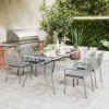 Outsunny 5 Piece Wicker Garden Dining Set, PE Rattan Garden Furniture Set with 4 Stackable Chairs, Tempered Glass Top Table and Cushions, Outdoor Table and Chairs for Patio, Conservatory, Light Grey
