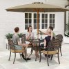 Outsunny 5 Pieces Cast Aluminium Garden Dining Set, 4 Seater Garden Table and Chairs with Parasol Hole, Outdoor Garden Furniture Set with Cushions for Patio, Bronze Tone