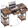 HOMCOM Computer Desk with Power Outlets, 120cm Home Office Desk with 3 Fabric Drawers and 4 Storage Shelves, Study Table Workstation for Bedroom