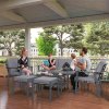 Outsunny 6 Piece Rattan Garden Furniture Set with 3-Seater Sofa, 2 Chairs and 2 Footstools, 7 Seater Outdoor Sofa Set with Glass Top Coffee Table and Cushions for Balcony, Grey