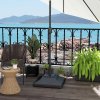 Outsunny Square Parasol Base with Wheels, 45kg Water or 60kg Sand Filled, Heavy Duty HDPE Umbrella Stand with Double Adjustable Knob, Fillable Parasol Stand for 38mm and 48mm Poles, Black