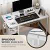 HOMCOM Computer Desk with Power Outlets, 120 x 60 cm Home Office Desk with Reversible Storage Shelves and Headphone Hook, Study Table Workstation for Bedroom, White