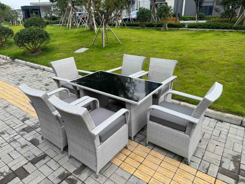 Fimous Light Grey Rattan Outdoor Garden furniture Set Black Tempered Glass Dining Table and 6 Chairs Set with Seat Cushion