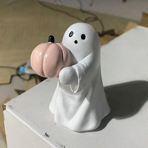 Living and Home Halloween Ghost Hugging Pumpkin Figurine